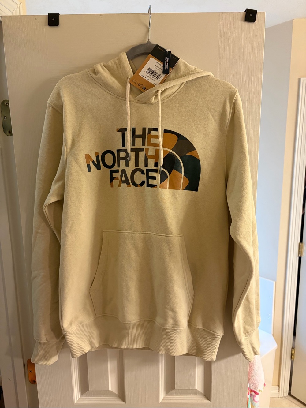 The North Face Men's Cream Hoodie with Multicolor Logo